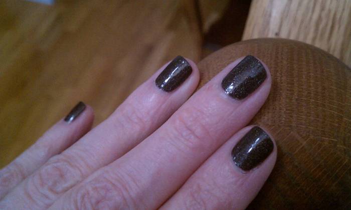 Got the claws trimmed! Wonderful iron grey polish with iridescent sparkles. Probably not "brand" at work, but I'll keep a low profile and wear gloves coming in and out of the lobby.