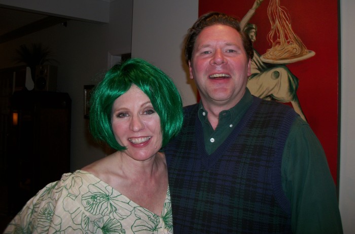 Happy hosts! That's me in the green wig.  (any excuse)